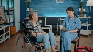 Nurse giving assistance to retired woman in nursing home. Caretaker at facility reading book for old disabled patient in wheelchair, medical assistant comforting person with chronic disease SSUCv3H4sIAAAAAAAACnRSy24bMQz8FUNny9VbK9/6SBsUTZFbD3ER0BIVL7JeGbvaFEWQfy+1SY69CBQ1MySHemZHmPvI9s+sH4ZlrhPUvoxsL7ZswjHhtIZPk3ZijTD1tUw9DOvtCDWeRjgj24/LMLxs2VyhLjPOpEi3CBUfCL7e30vdPbc827NrhKGeIkz44YZ0I4mSwHKkp5t+jjgMMGJZZvayfafcYrkM+D/Y7y2DBxzj31adyk84IKzN3LFoVJI+Gh5DFNwE0fGgNPCg3RGDMNorTbrKqc5jytwZ6wgWOg5ZWu6Td1qjlCAVwcA4ldAk7rNT3EQjOXipeM5B+Ny5FFOD2WyOThIs2my5sUdS6+hASEK7GEK0phWVllCYubLJc+MTqTnlubManMVkXegI5qIQMifNTVKRDul5oGa5gICowWinMiMPHv9UnM5vK4Al9aW5/1TIYEpqSl6mPvbjwyui1FNbM1lclrFOZB6jYkMpFziS1/tMNNyyE8wzAdJbom2X/ks5v4qMpTafGzPR0imSWnnfdT50ygWnRNfsff0ep56IrVBjUhgf+/TWbk/6DFz0XYjIMQtD7kbHQejArRFZS+mVco7ElstQINU2HTFzmc7rH5lgpvnXEWjiC9QTJa/2h4PcbX6V6ZEG39yeSi3z4eC93m2+Xm0+DQtufvRP7Y1vfi7T3KLrcsaV9qWMFHwUQt0Lq6QU1t1/FkHthAjGGG9332+/sZd/AAAA//8DAG7idpBOAwAA